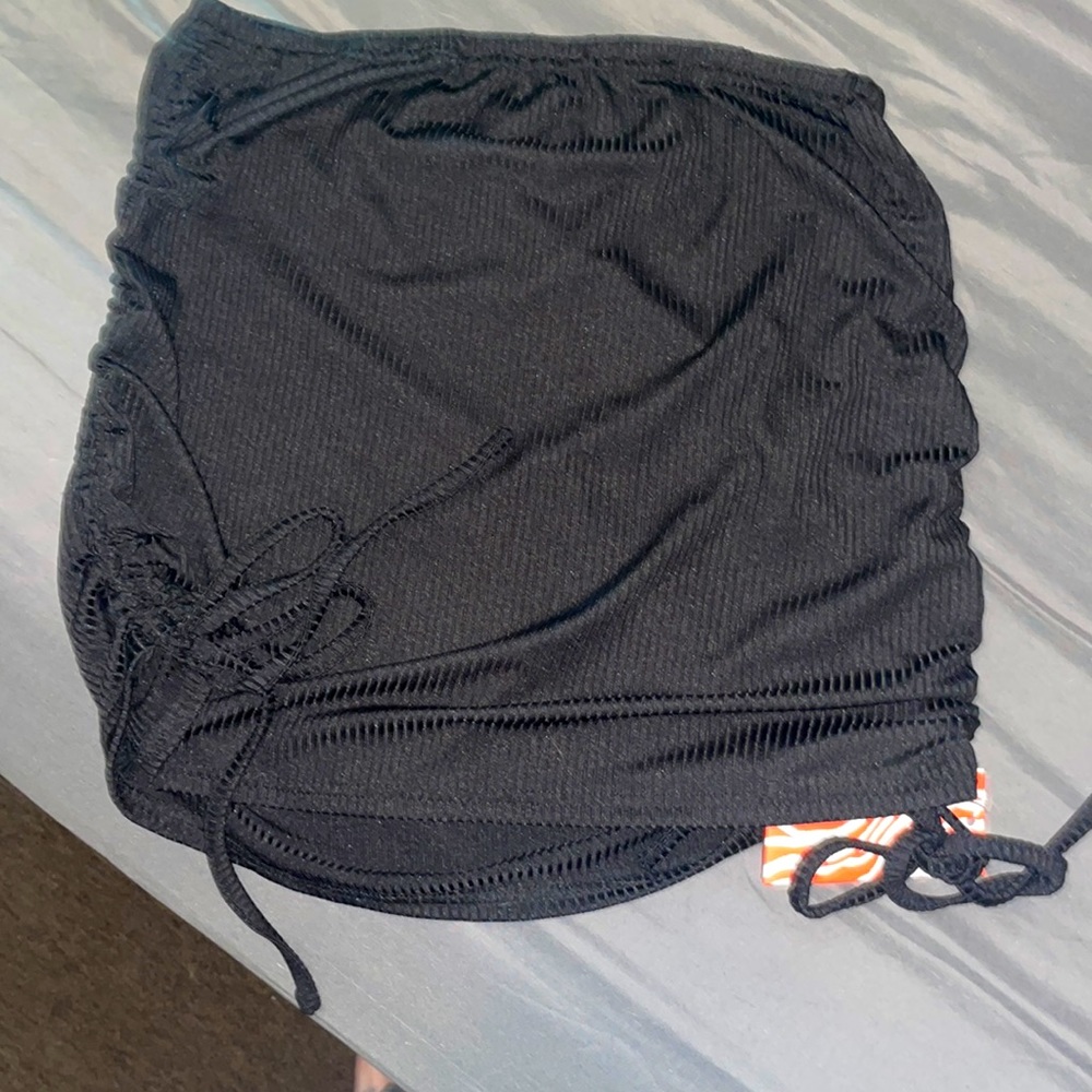 Woman’s brand new size small black skirt